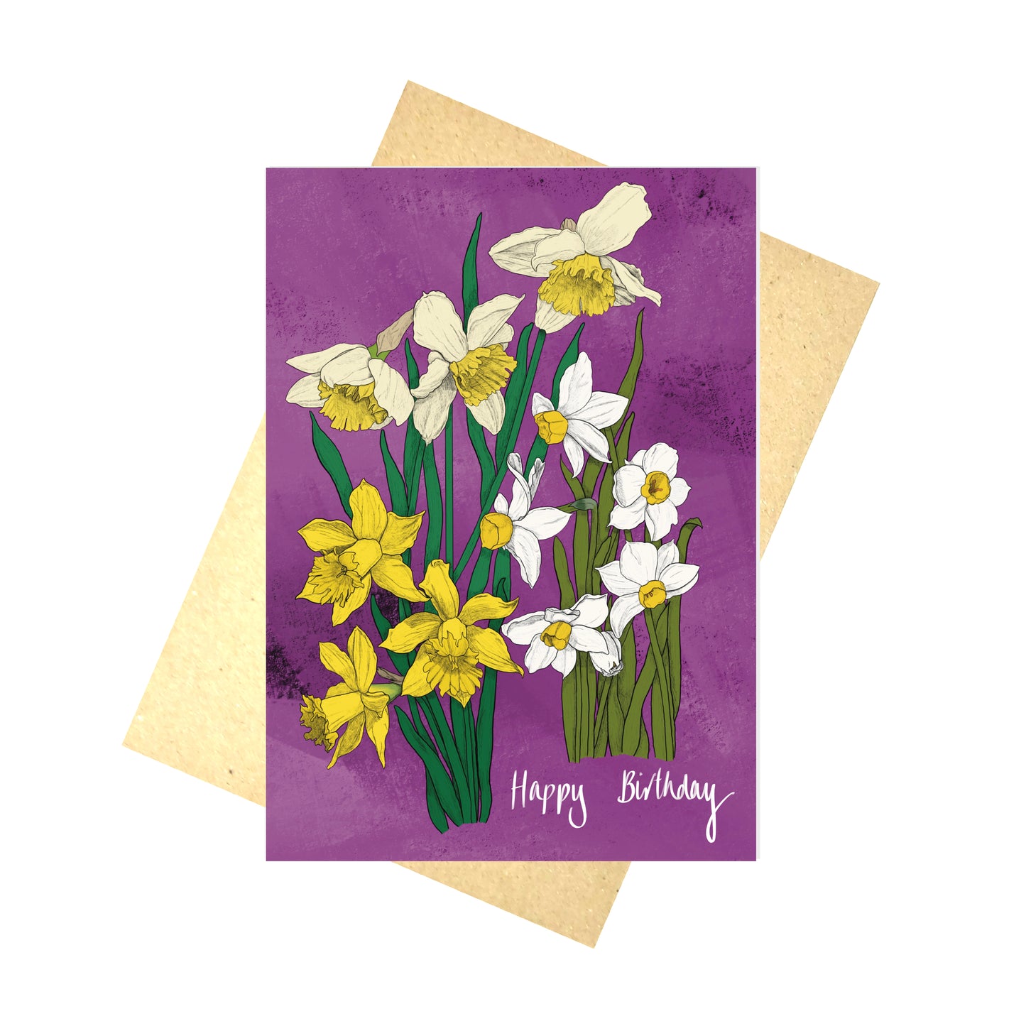 A magenta card featuring yellow and white daffodils and the words 'Happy Birthday' in white handwriting. Behind the card is a brown envelope and a white background.