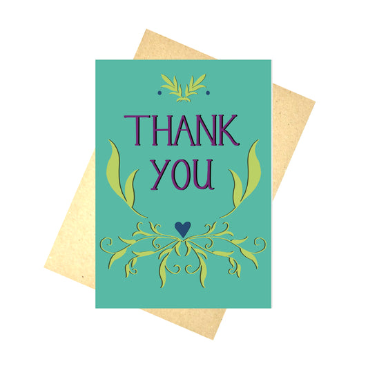 A bright teal thank you card featuring a green leafy symmetrical pattern and the words 'Thank You' in pink and black handwriting.