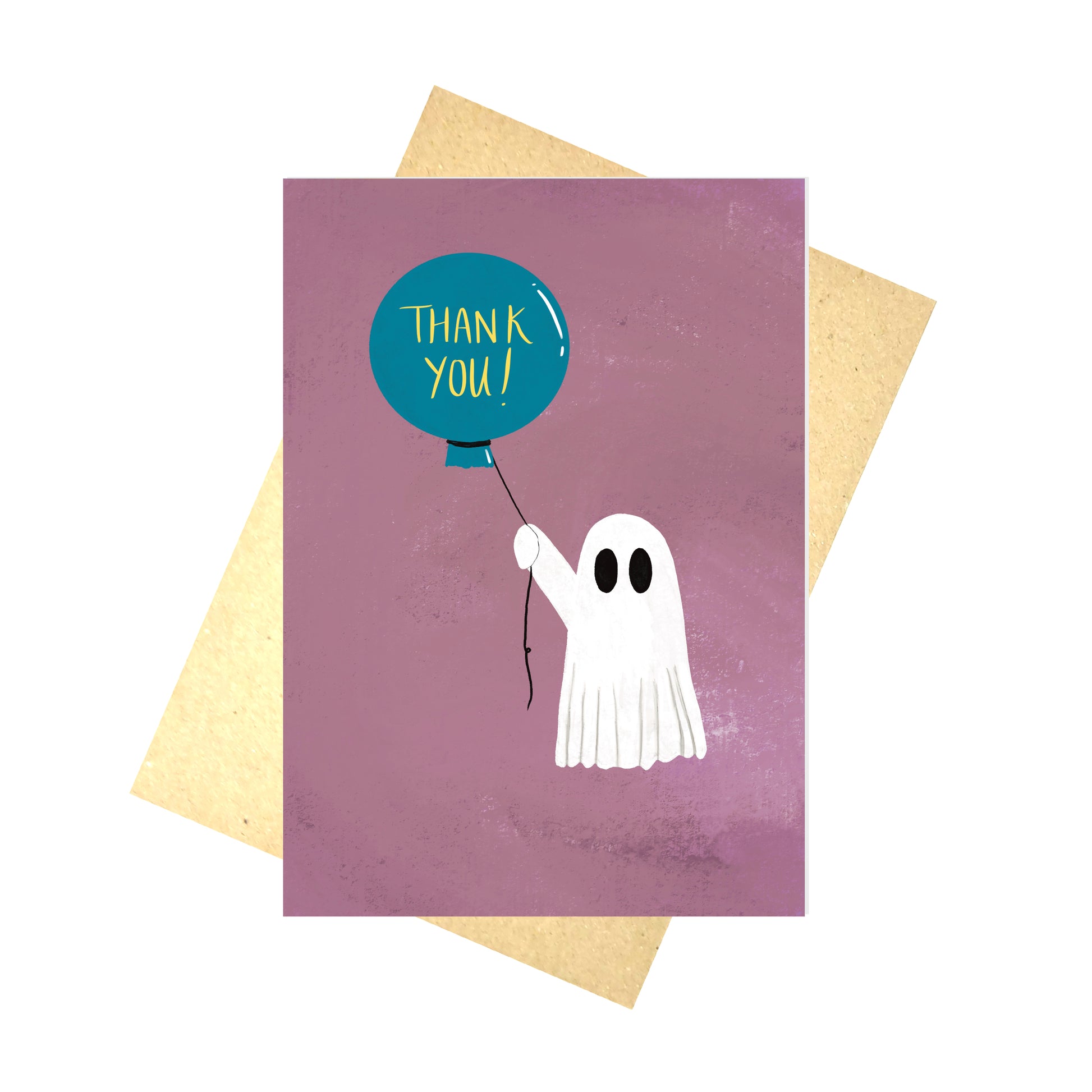A warm pink greetings card with a white ghost holding a blue floating balloon that reads 'Thank You!'in yellow handwriting.