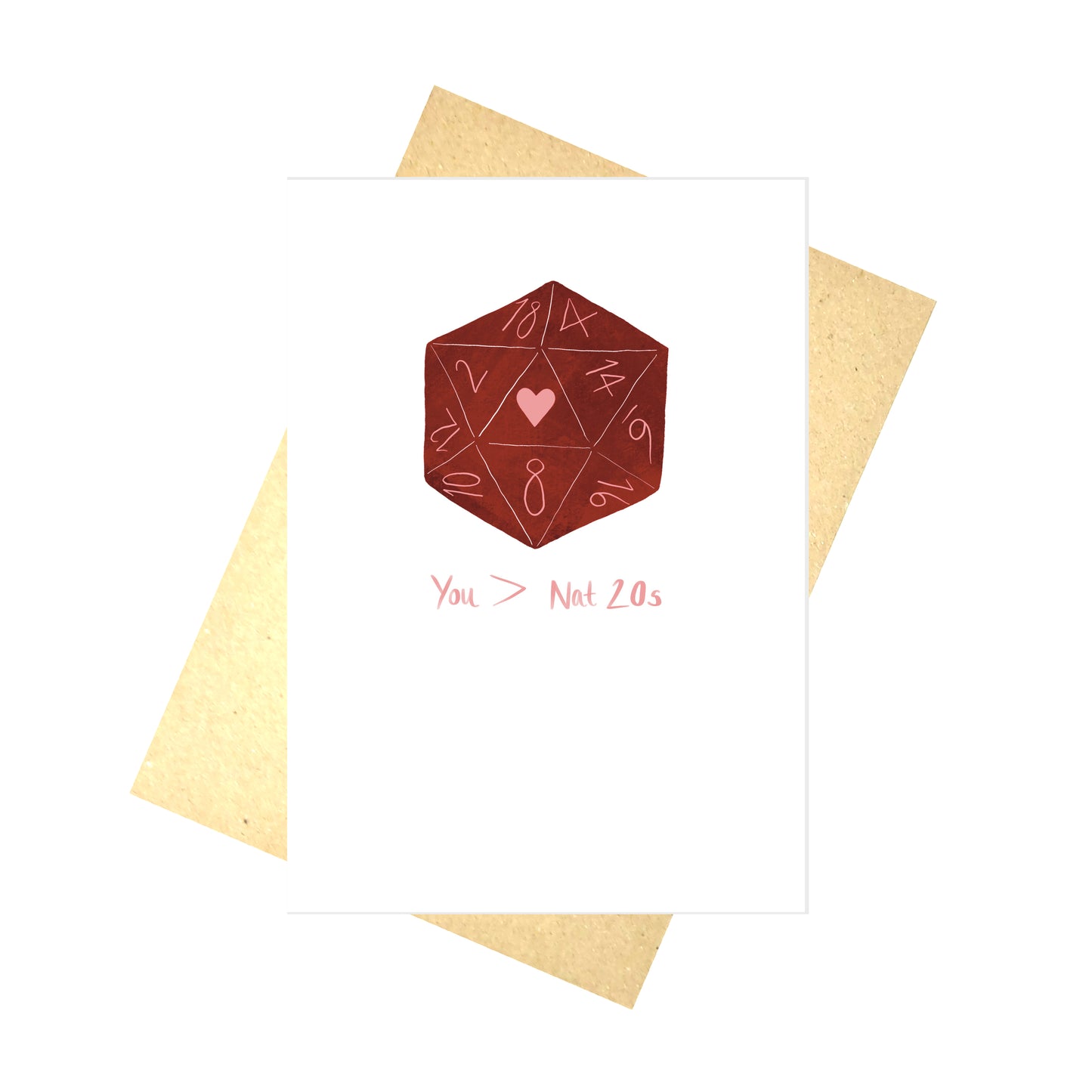 A white card with a deep red d20 dice with a pink heart where the 20 would be. Under the dice are the words 'You > Nat 20s' in pink handwriting. Behind the card is a brown envelope and a white background.