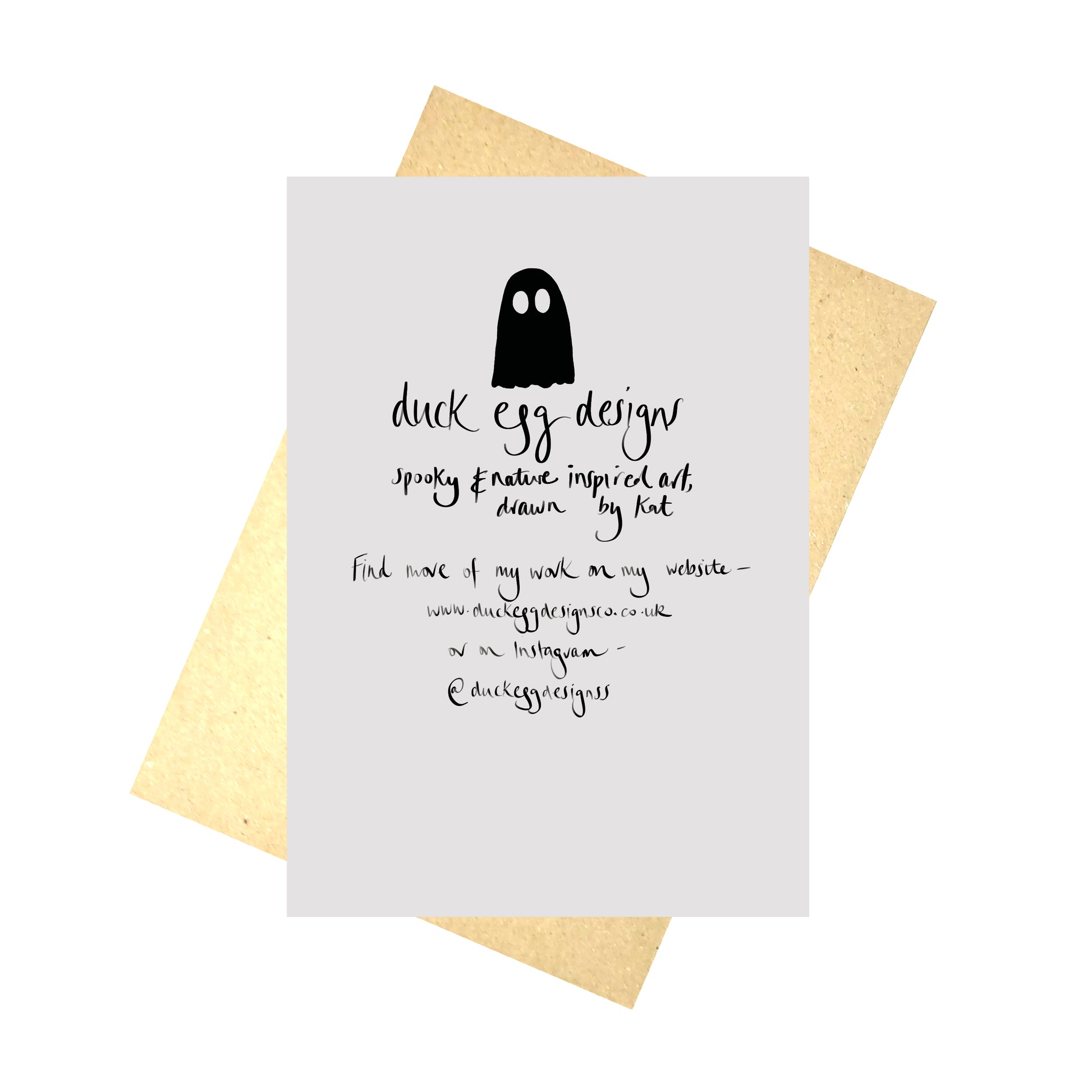 The back of the card featuring the Duck Egg Designs logo, website and social media information in black on a light grey background. Behind the card is a recycled envelope, behind which is a white background.