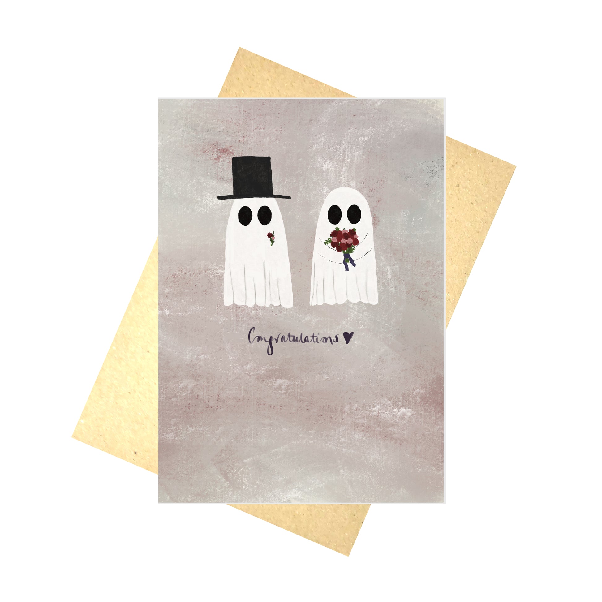 A dusky pink card with two ghosts - the one on the left has a floral buttonhole and top hat while the one on the right carries a bouquet of flowers. Writing underneath the ghosts reads 'Congratulations' in black with a black heart next to it.